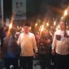 Wakil Bupati Karawang Maslani Pimpin Pawai Obor