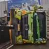 Truk milik PT Sumisho Global Logistics terguling di depan Pollux Mall Cikarang, Jalan Raya Cikarang–Cibarusah,