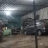 Ilustrasi bengkel mobil yang dapat menjadi pilihan bagi pengendara.